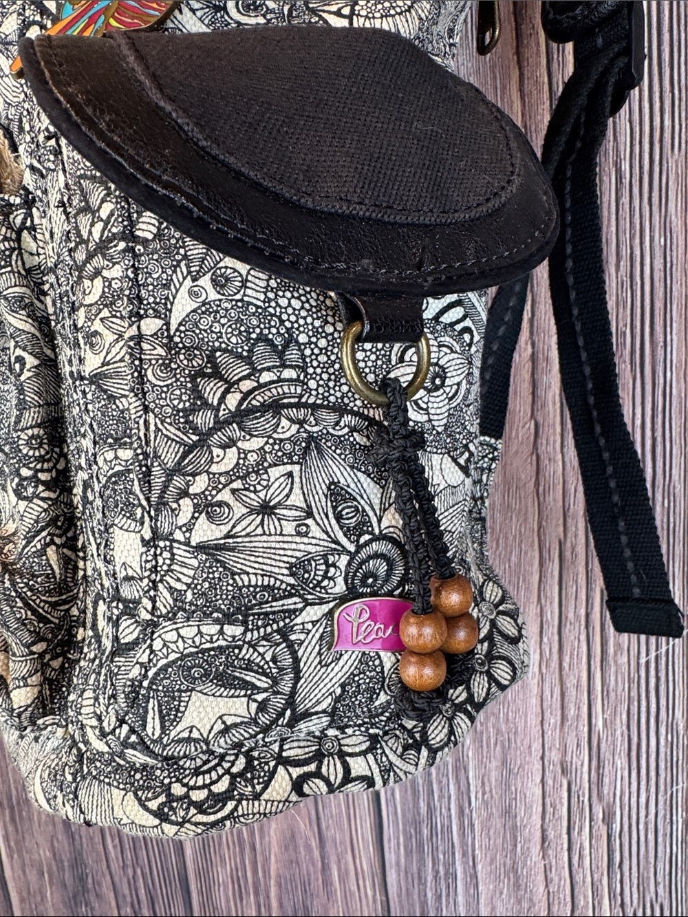 Sakroots Black and Cream Floral Canvas Backpack with Pink Accent Straps - Picture 5 of 14